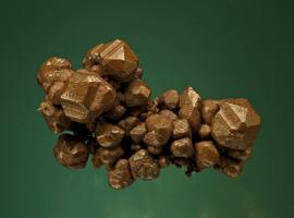 Copper, Keweenaw Peninsula, Michigan. Sharp tetrahexahedral copper crystals. Donor: L. L. Hubbard. Specimen 5 cm wide. Photo by G. Robinson. (LLH 488)