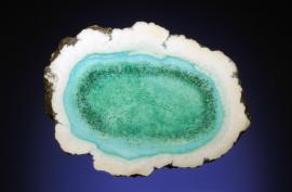 Datolite, Centennial #2 Mine, Houghton County, Michigan. A white datolite nodule with blue-green core. Donor: F. Henderson. Specimen 5.5 cm wide. Photo by G. Robinson. (DM 22393)
