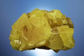 Sulfur, Racalmuto, Agrigento, Sicily, Italy. The world’s finest sulfur specimens come from Sicily. This specimen was collected by University of Michigan professor Walter Hunt gifted by Hunt to E. W. Heinrich who in turn gifted his entire collection to the A. E. Seaman Mineral Museum. Donor: E. W. Heinrich. Specimen 11.5 cm wide. Photo by C. Stefano. (DM 24436)