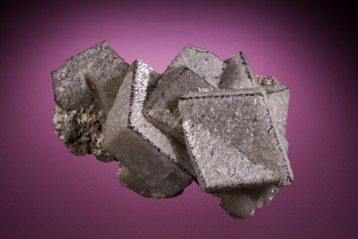 Calcite, Naica, Chihuahua, Mexico. Twinned calcite crystals with edges accented by tiny pyrite crystals. Donor: P. & J. Clifford. Specimen 11.5 cm long. Photo by M. Schorr. (PJC 11132)