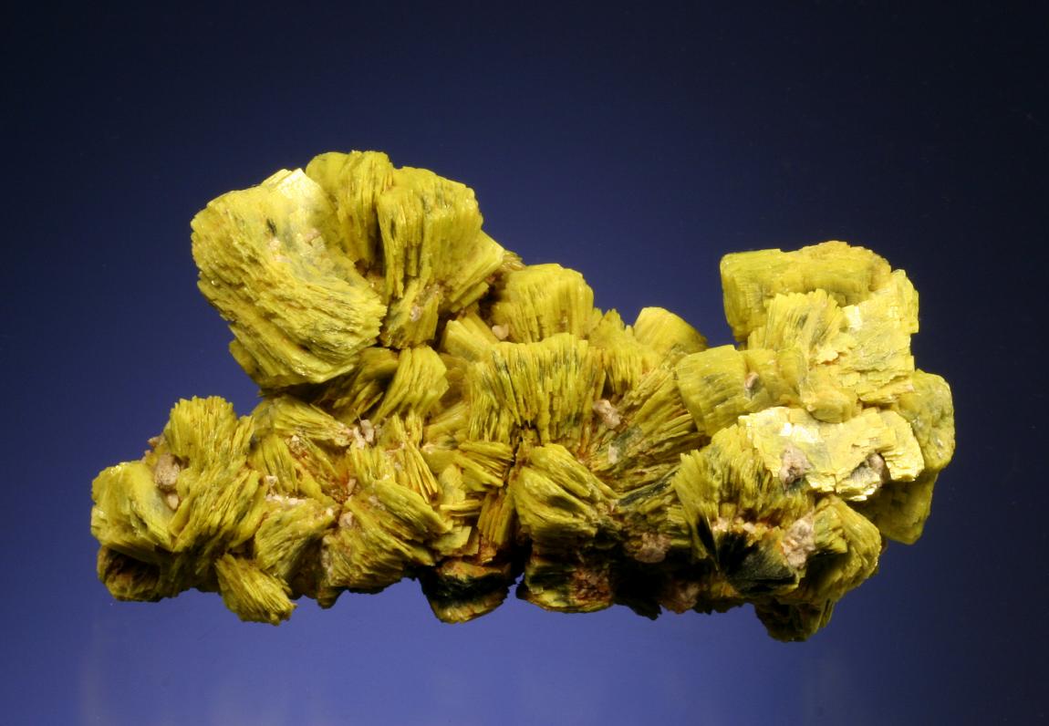 Autunite, Daybreak Mine, Spokane, Washington. A fine example of this uncommon uranium mineral. Specimen 8.5 cm wide. Photo by G. Robinson. (DM 23181)