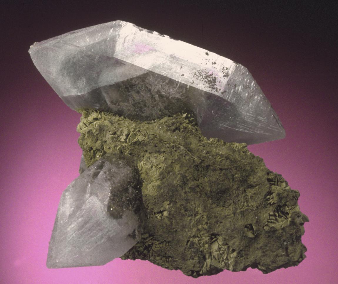 Celestine, Rockwood Quarry, Wayne County, Michigan. A sharp, doubly terminated crystal of gray-blue celestine perched on limestone matrix. Donor: S. Dyl. Specimen 6 cm wide. Photo by J. Jaszczak. (DM 23205)