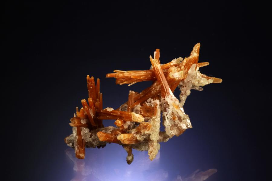 Quartz, Dalnegorsk, Primorskii Kray, Russia. Rare, red quartz crystals from Dalnegorsk, Russia. Donor: P. and J. Clifford. Specimen 9.5 cm wide. Photo by C. Stefano photo. (PJC 06092) 